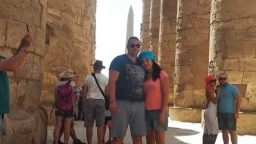 Karnak Temple, located on the east bank of the Nile in Luxor, Egypt, is one of the largest and most impressive ancient temple complexes in the world. It was primarily dedicated to Amun-Ra, the chief deity of Thebes, along with his consort Mut and their son Khonsu. Construction began around 2000 BCE and continued for over 2,000 years, with contributions from numerous pharaohs, including Senusret I, Thutmose III, and Ramses II.