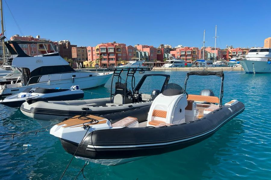 A speedboat moored in a marina