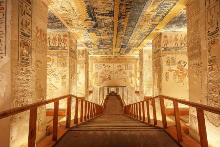 Painted ceiling and hieroglyph-covered walls above a wooden walkway in a royal tomb, Valley of the Kings, Luxor
